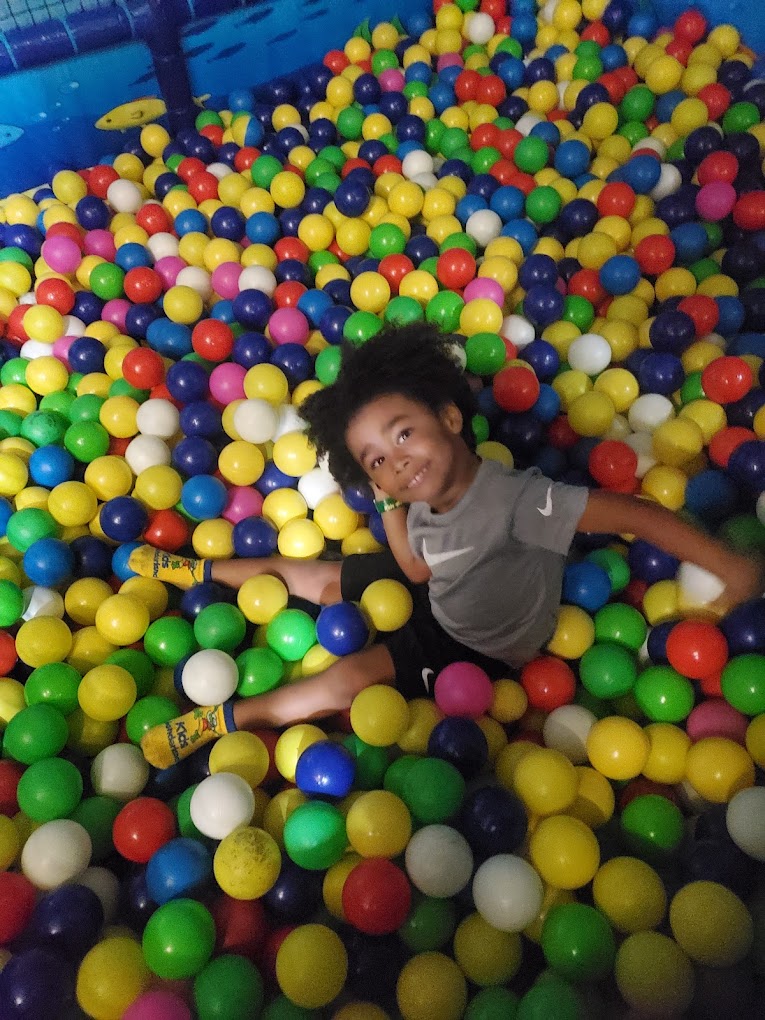 Child playing in the ball pit at Kids Wonderland McAllen